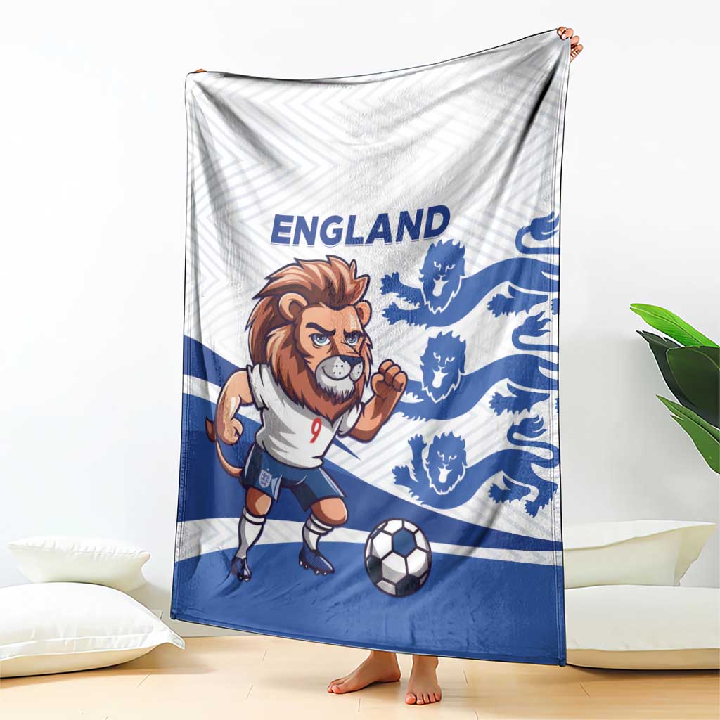 England football blanket draped on sofa with lion mascot, blue crests, and soccer ball