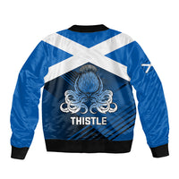 Blue bomber jacket back with large thistle graphic, white chevron stripes, ribbed hem.