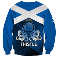 Unisex blue sweatshirt with white X panels and thistle crest back graphic