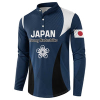 Blue long-sleeve button sweatshirt with JAPAN text, Young Nadeshiko crest, flag patch.