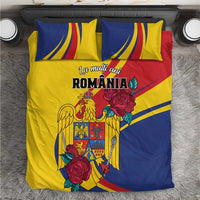 Yellow and blue Romania bedding set with roses and eagle crest, includes two pillowcases.