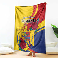 Folded Romania-themed blanket in yellow, blue, and red with roses and heraldic emblem