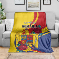 Romania flag style blanket with yellow, blue, and red panels and rose and winged crest design