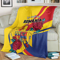 Draped yellow, blue and red blanket with Romania crest and large rose flowers print
