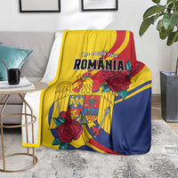 Living room styled blanket featuring yellow, blue and red colors, roses, and heraldic Romania emblem