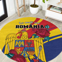 Round yellow carpet with Romania graphic, golden eagle and roses in red, blue accents.