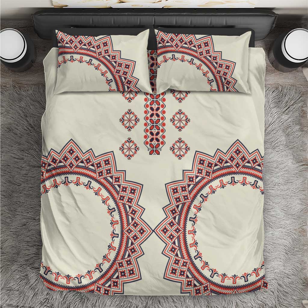 Beige bedding set with red and blue traditional diamond and circle embroidery, including 2 pillows