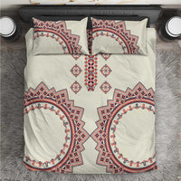 Beige bedding set with red and blue traditional diamond and circle embroidery, including 2 pillows