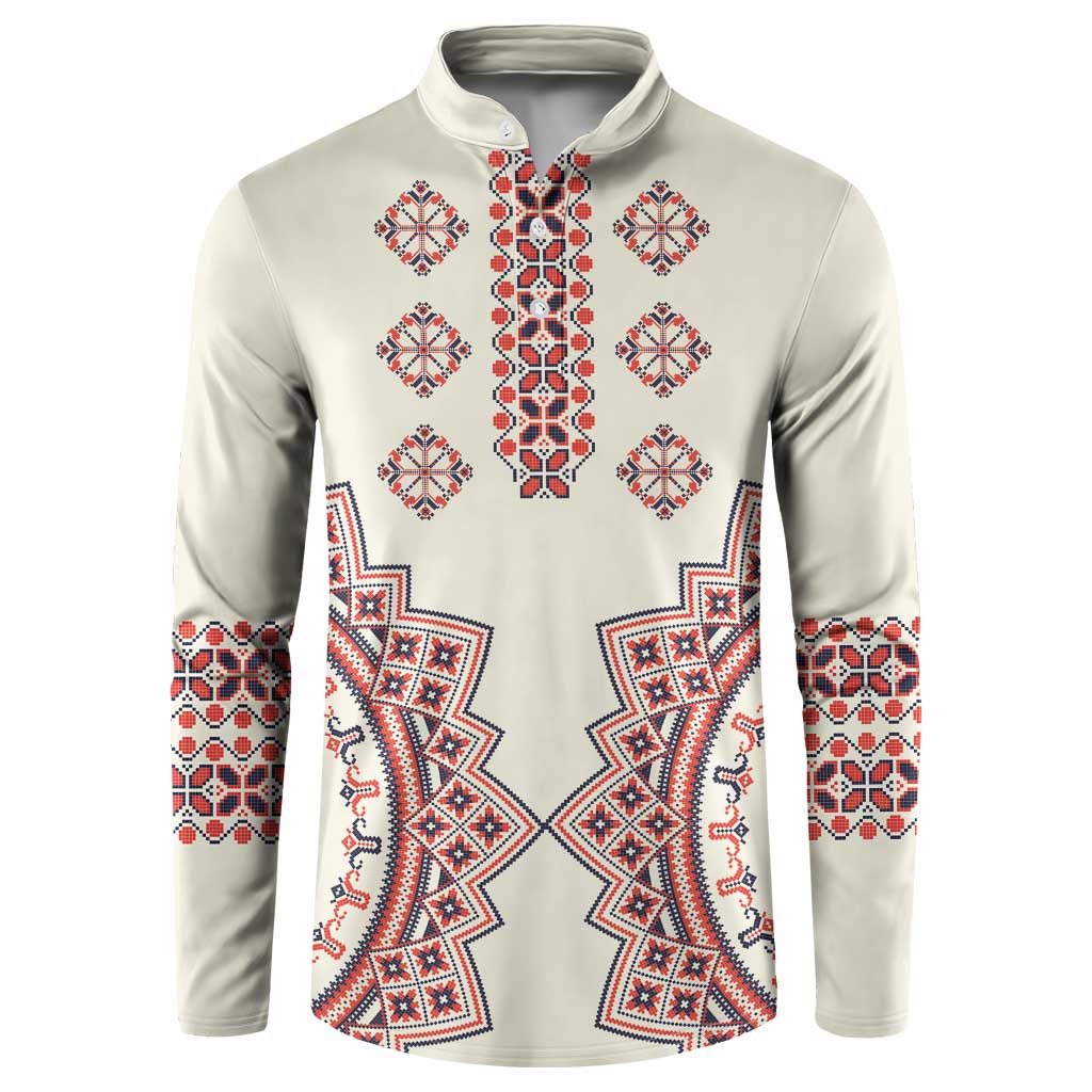 Beige button sweatshirt with red and blue folk embroidery panel and long sleeves