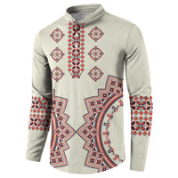 Beige button henley sweatshirt with central folk star pattern and patterned cuffs