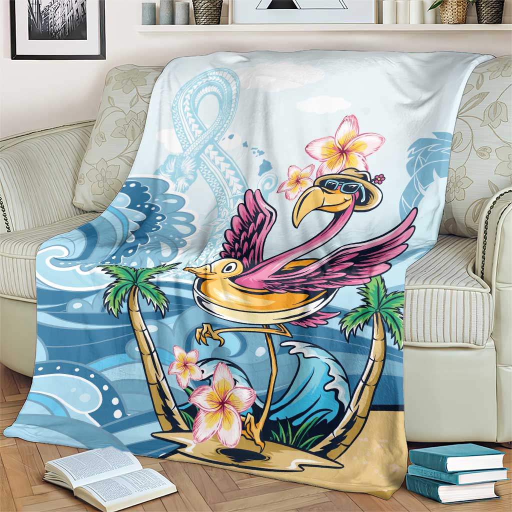 Blue tropical blanket with flamingo and plumeria flowers, draped across couch arm