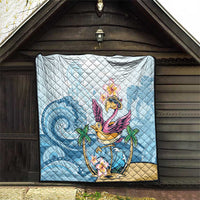 Blue tropical flamingo quilt hanging inside a porch with quilted diamonds