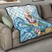 Blue tropical flamingo quilt on living room sofa with quilted corner edging