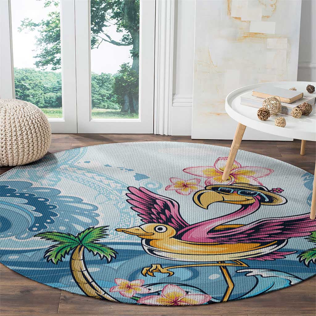 Blue round beach carpet with large flamingo graphic, palm leaves, and flower details
