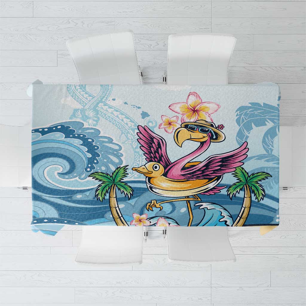 Blue tropical tablecloth with flamingo, plumeria flowers, and palm leaf pattern