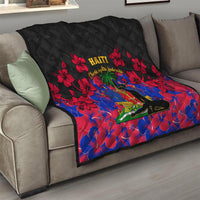 Black Haiti-themed quilt on sofa with red hibiscus flowers and Haiti text