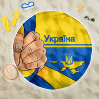 Round beach blanket with Ukraine flag graphic, comic fist and trident, white fringe edge