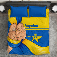 Blue and yellow bedding set with fist graphic, Ukraine map, two pillowcases and duvet
