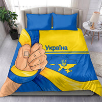 Blue and yellow bedding set with Ukraine text and map, two pillowcases and duvet