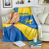 Ukraine Unity Day blanket with blue and yellow design and clasped hands