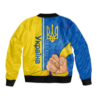 Blue and yellow bomber jacket, back view with trident emblem and hand illustration