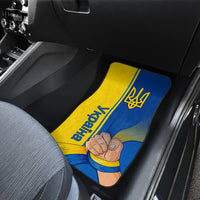 Car floor mat in blue-and-yellow Ukrainian flag design with trident and ribbon