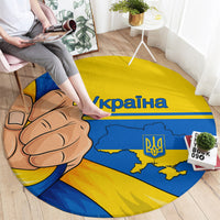 Round carpet with blue-and-yellow Ukraine design, clenched hand graphic, map and trident