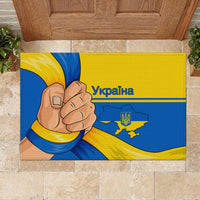 Blue and yellow Ukrainian flag rubber doormat with "Ukraina" text and trident