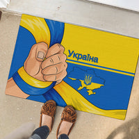 Blue and yellow Ukrainian flag rubber doormat with raised fist, "Ukraine" and trident