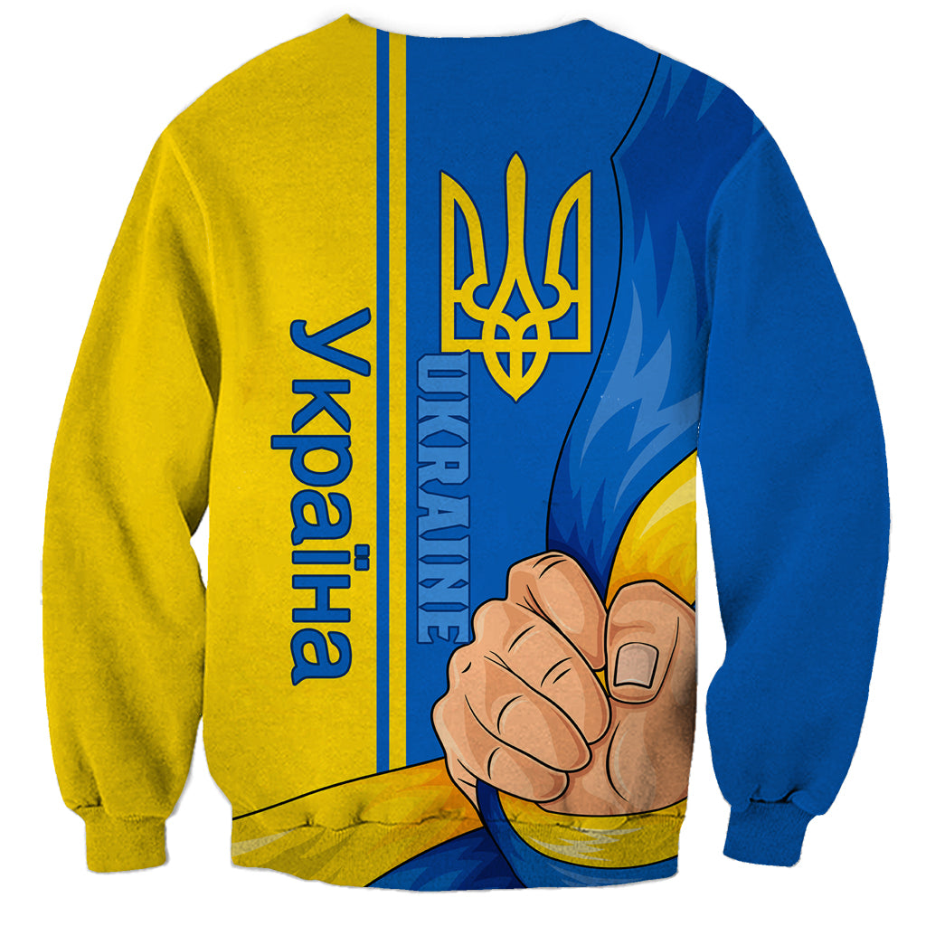 Unisex blue and yellow sweatshirt with trident emblem and fist graphic on back