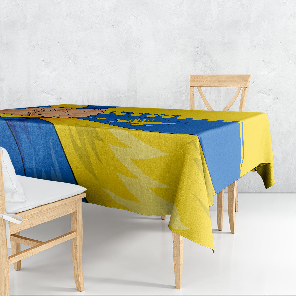 Ukraine Unity Day tablecloth draped on wooden dining table, blue and yellow design