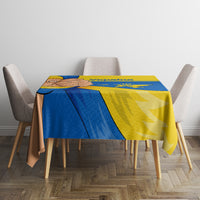 Ukraine Unity Day tablecloth on table with four chairs, blue and yellow trident center