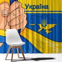Blue and yellow curtain panel close-up with trident emblem and Ukraine map graphic