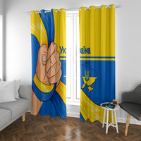 Blue and yellow curtain panels with trident emblem and map graphic, hung on rods