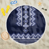 Navy blue round beach blanket with white folk pattern and fringe border