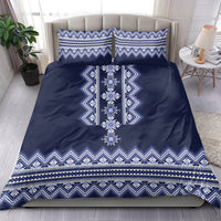 Navy blue duvet cover with white-blue folk trim pattern and two matching pillowcases