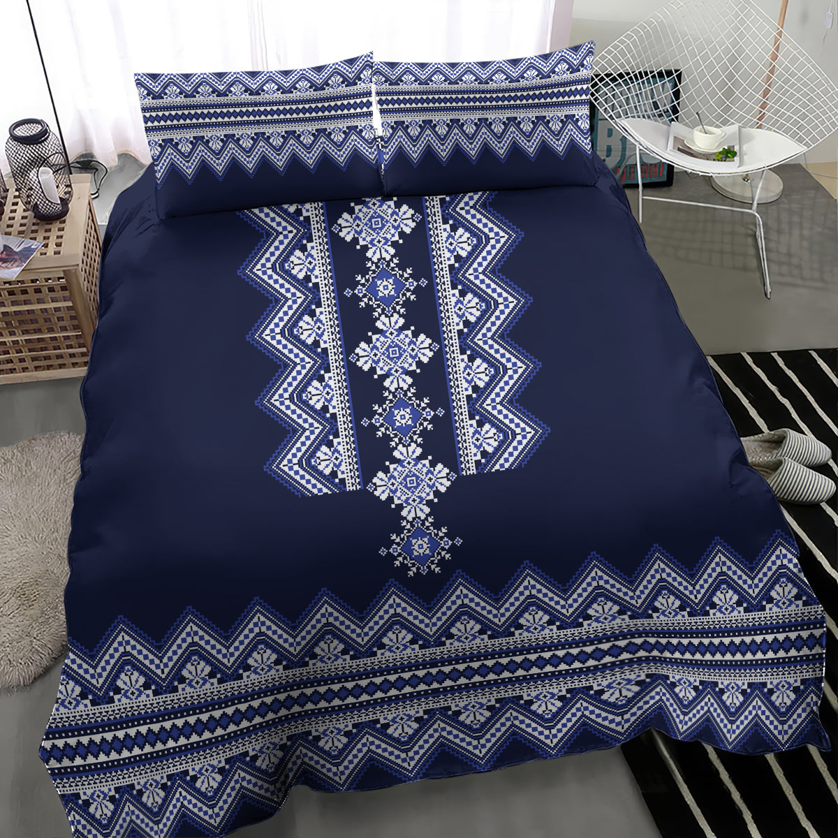 Navy blue bedding set featuring vertical white-blue folk motif on a duvet with two pillowcases