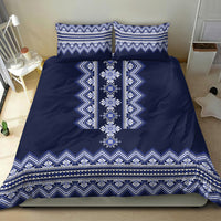 Navy blue duvet cover with bold white-blue folk border pattern and two matching pillowcases
