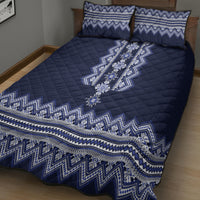 Navy quilt bed set with bold folk geometric stripe pattern and two matching square pillow shams