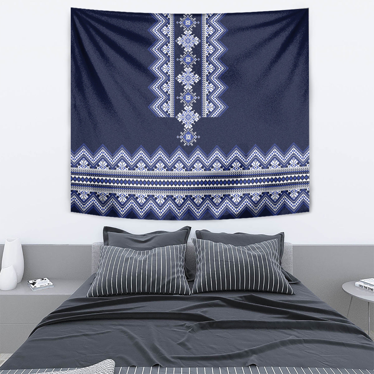 Navy blue rectangular tapestry with vertical geometric pattern and zigzag stripe borders