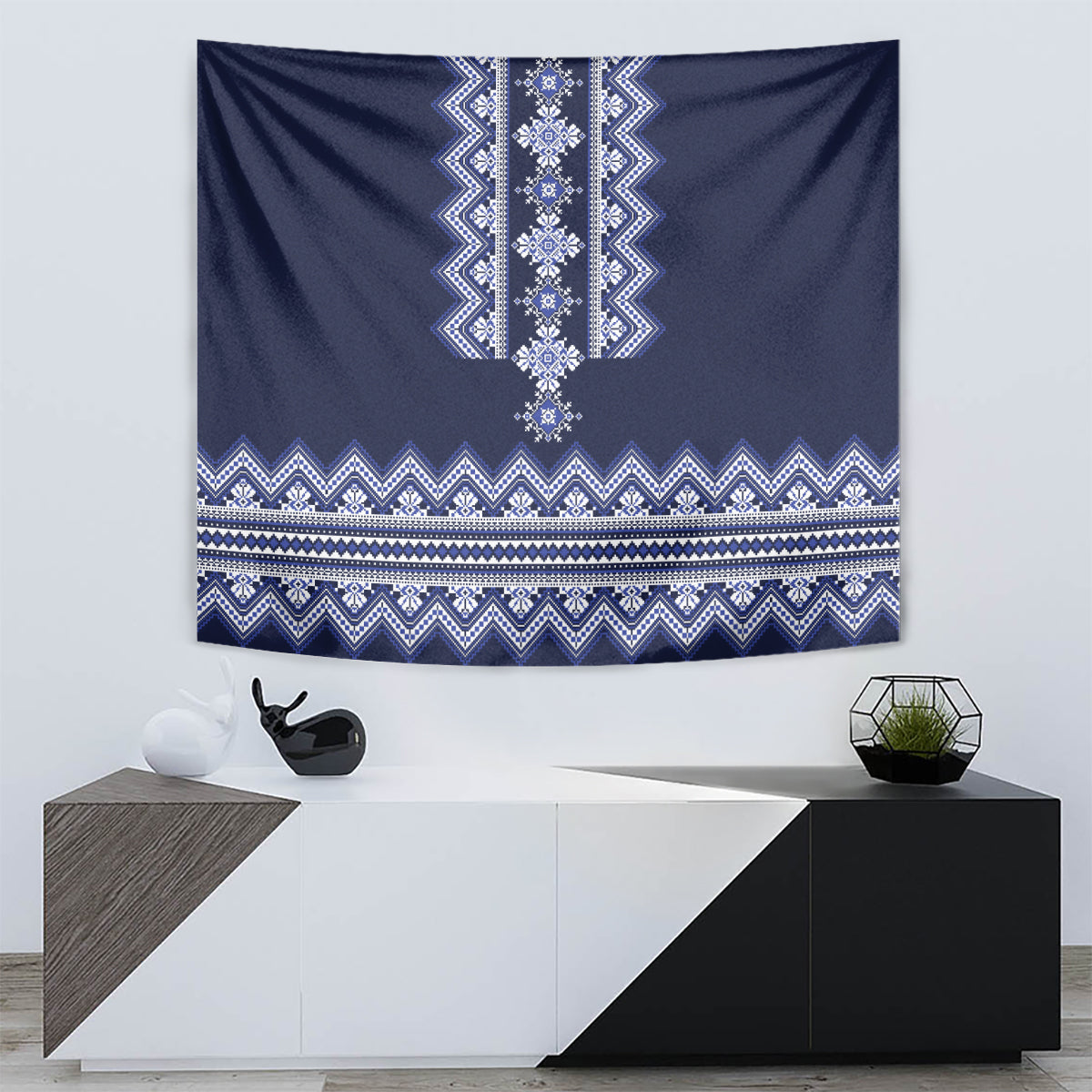 Navy blue wall tapestry with vertical embroidered motif and horizontal folk border stripes