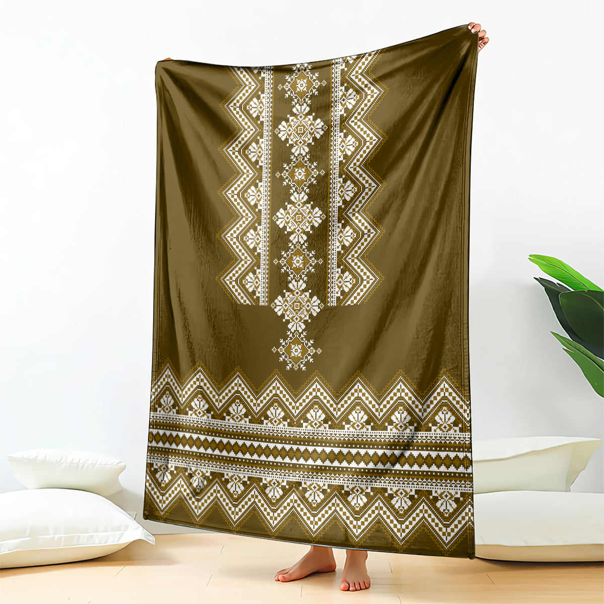 Brown folk geometric throw blanket with central vertical medallion and zigzag border