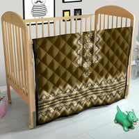 Brown quilt crib blanket with diamond quilting and white folk stripe border