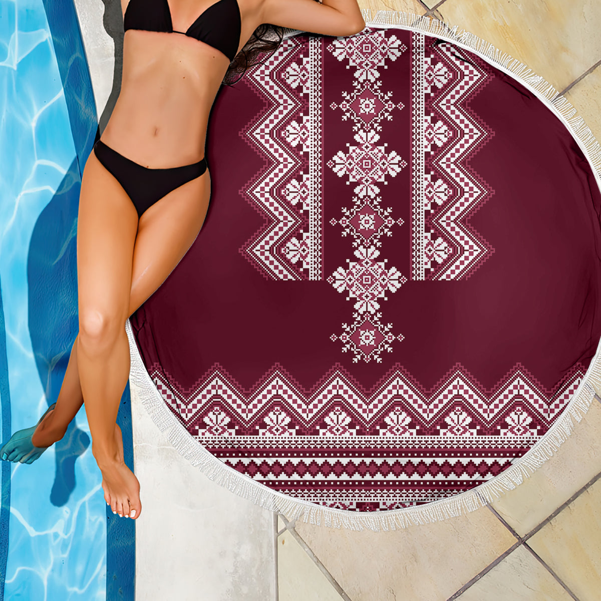 Wine red round beach blanket with white central stripe folk embroidery and fringed edge, 150cm