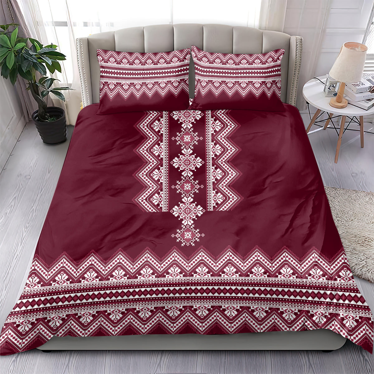 Wine red bedding set with central white geometric motif and two matching decorative pillowcases