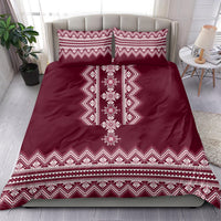 Wine red bedding set with central white geometric motif and two matching decorative pillowcases