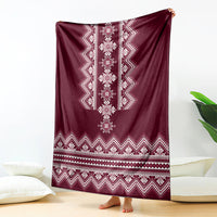 Wine red folk pattern blanket with white geometric diamond center and border