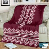 Wine red folk pattern blanket with white vertical diamond motif and zigzag hem