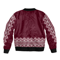 Burgundy bomber jacket back with folk stripe pattern and ribbed hem, no front view