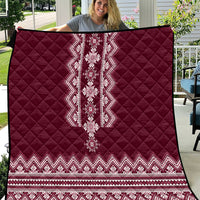 Wine red quilt with diamond quilting and white folk stripe medallion center